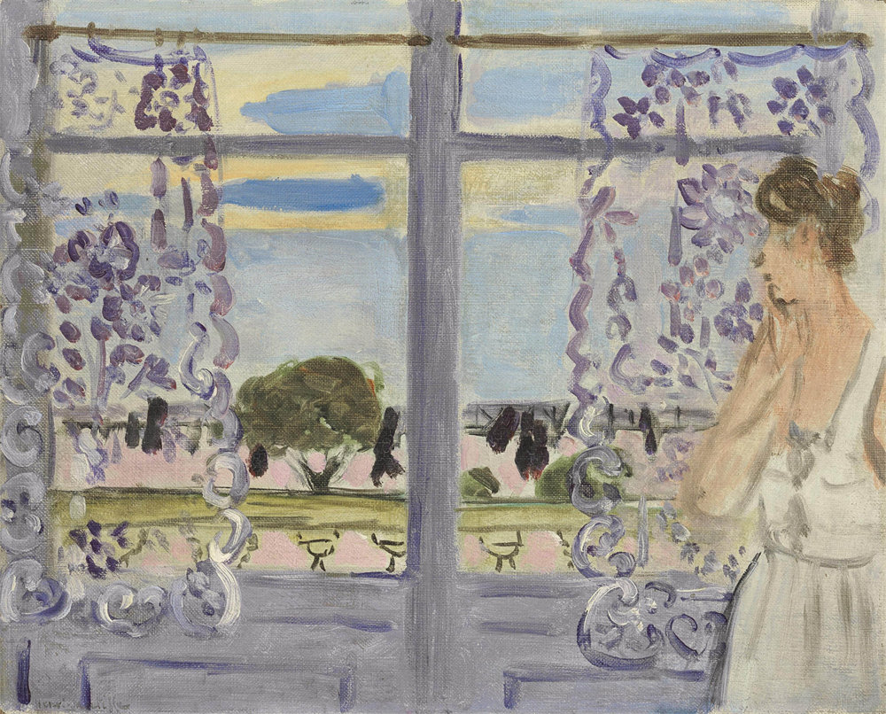 Femme Auprès De La Fenêtre