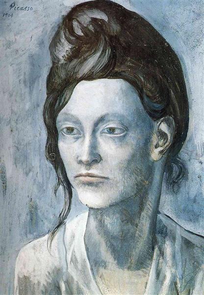 Woman with her hair in a small bun