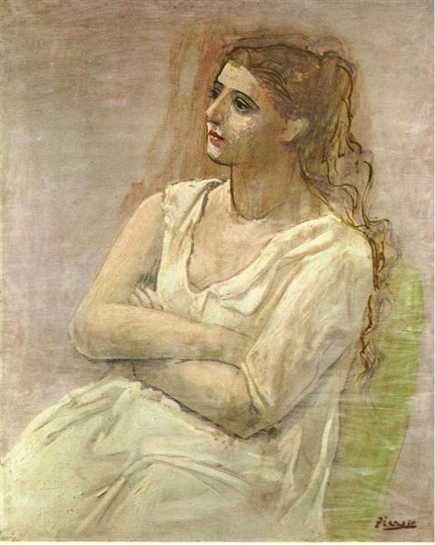 Seated woman with her arms folded (Sarah Murphy)