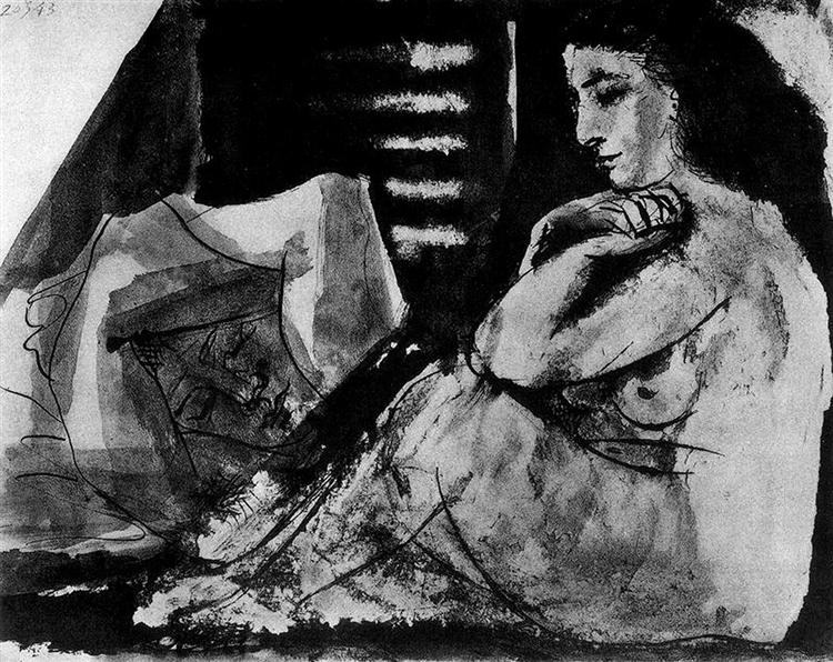 Sleeping man and sitting woman