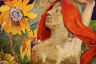 Redheaded woman and sunflowers
