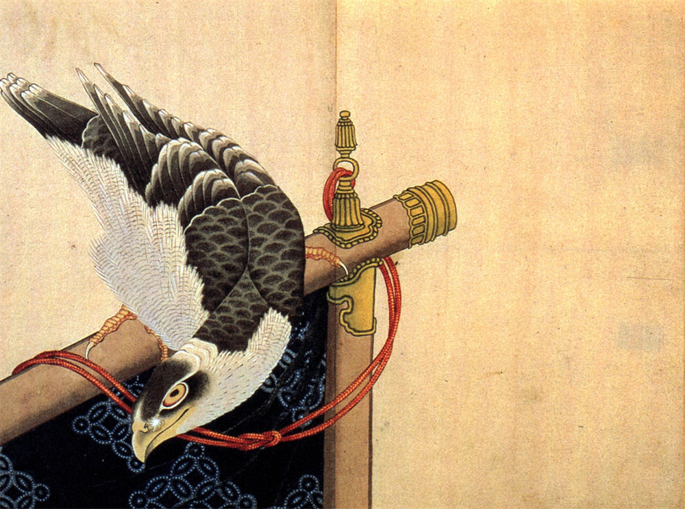 Hawk on a ceremonial stand 
