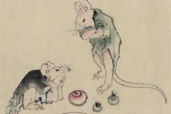 Two mice, one lying on the ground with head resting on forepaws