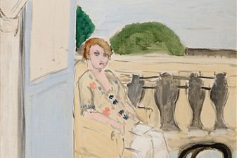 Woman Sitting On A Balcony