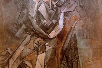 Woman sitting in an armchair