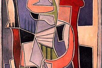 Woman sitting in an armchair