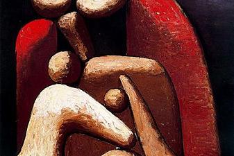 Woman in red armchair