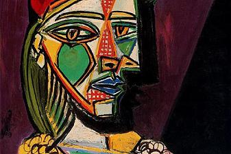 Woman in beret and checked dress