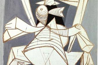 Woman sitting in an armchair