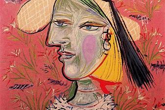 Woman with straw hat on flowery background