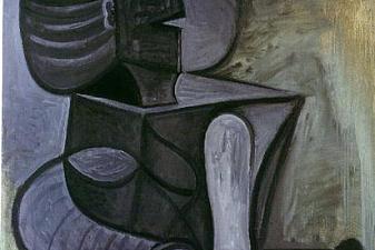 Seated woman with flat hat