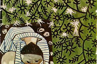 Child playing in camomilles