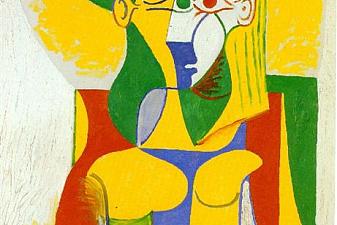 Woman sitting in an armchair