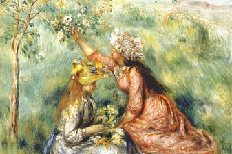 Girls picking flowers in a meadow