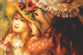 Girls putting flowers on their hats