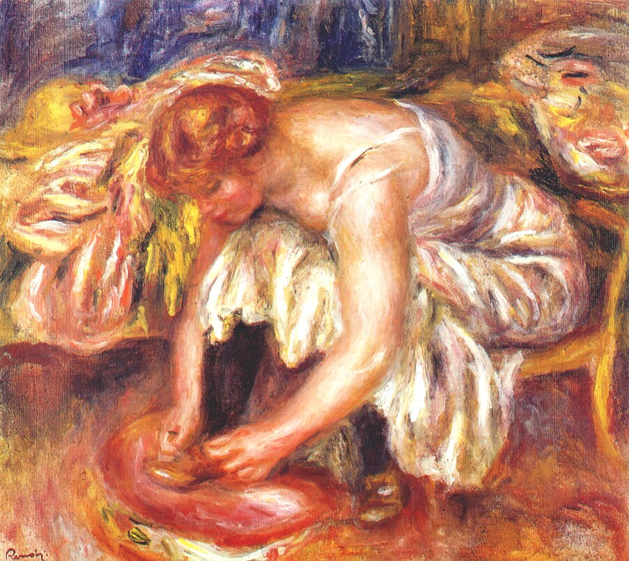 Woman tying her shoe 