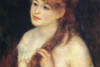 Young Woman Braiding Her Hair