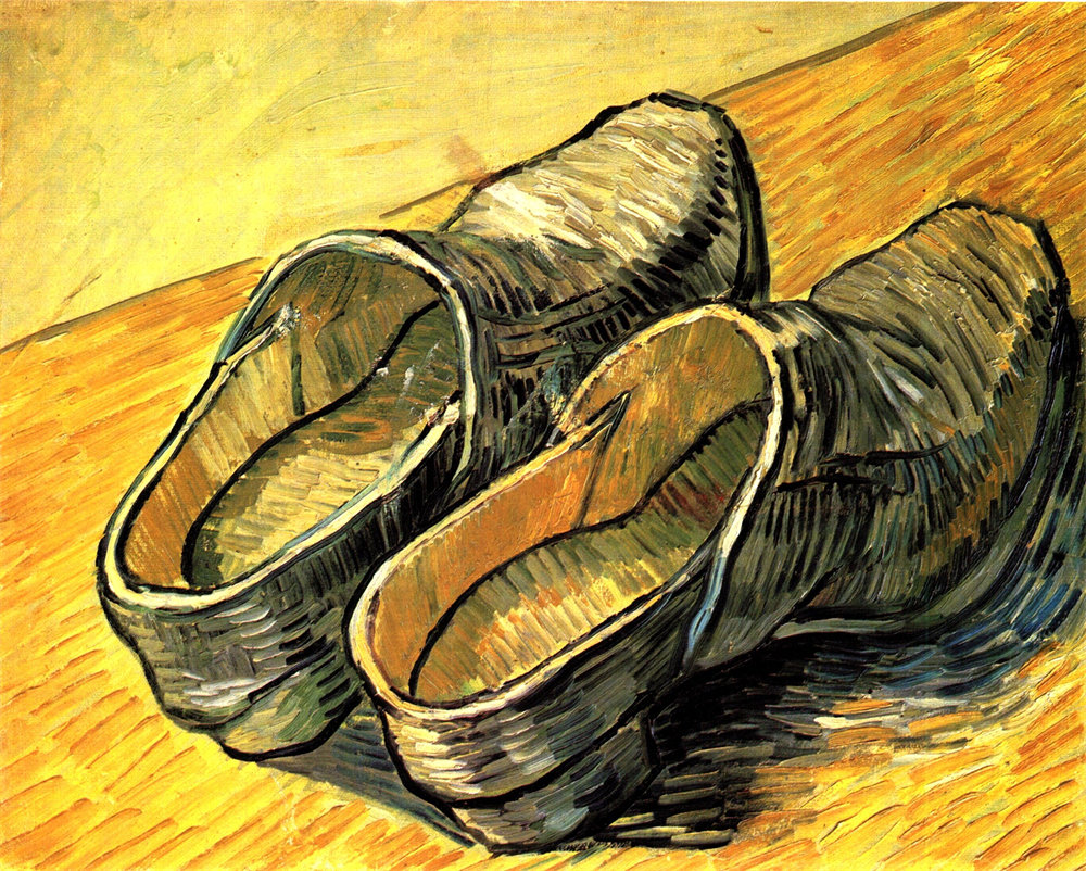 A Pair of Leather Clogs 