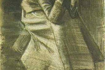 Woman Sitting on a Basket with Head in Hands