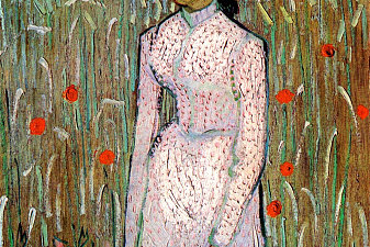 Young Girl Standing Against a Background of Wheat